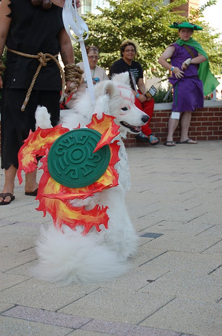 Illustration for article titled Meet a Dog That's Blissfully Unaware He's Cosplaying Amaterasu